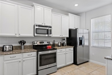 One-of-a-kind...OUTSTANDING Investment Property! This impeccable on The Oasis Club at Champions Gate in Florida - for sale on GolfHomes.com, golf home, golf lot