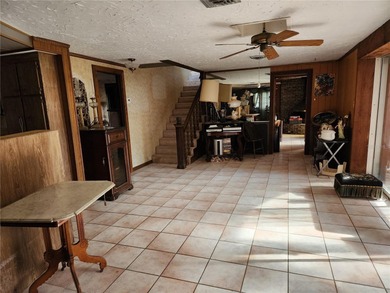 One or more photo(s) has been virtually staged. This charming on Jacaranda West Country Club in Florida - for sale on GolfHomes.com, golf home, golf lot