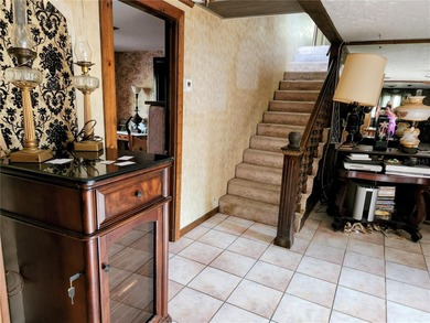 One or more photo(s) has been virtually staged. This charming on Jacaranda West Country Club in Florida - for sale on GolfHomes.com, golf home, golf lot