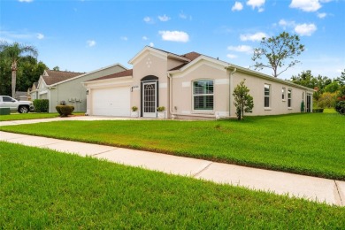 Wonderful home located on the 12th hole of the Lexington Oaks on Lexington Oaks Golf Club in Florida - for sale on GolfHomes.com, golf home, golf lot