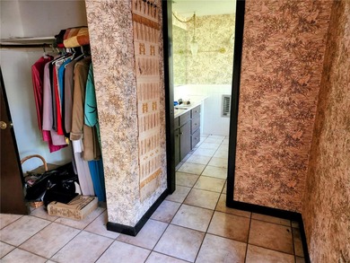 One or more photo(s) has been virtually staged. This charming on Jacaranda West Country Club in Florida - for sale on GolfHomes.com, golf home, golf lot