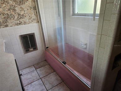 One or more photo(s) has been virtually staged. This charming on Jacaranda West Country Club in Florida - for sale on GolfHomes.com, golf home, golf lot