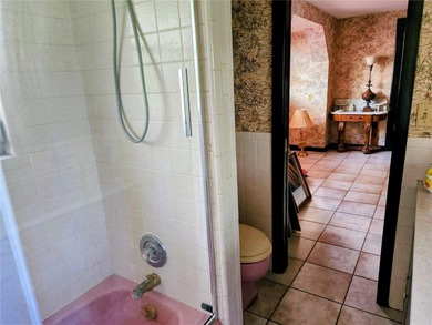 One or more photo(s) has been virtually staged. This charming on Jacaranda West Country Club in Florida - for sale on GolfHomes.com, golf home, golf lot