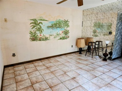 One or more photo(s) has been virtually staged. This charming on Jacaranda West Country Club in Florida - for sale on GolfHomes.com, golf home, golf lot