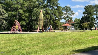 Custom-Built True Ranch by Ken Harvey Homes in Lake Royale-a on River Golf and Country Club at Lake Royale in North Carolina - for sale on GolfHomes.com, golf home, golf lot