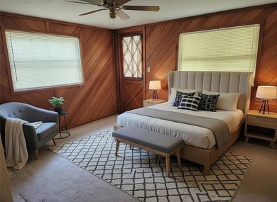 One or more photo(s) has been virtually staged. This charming on Jacaranda West Country Club in Florida - for sale on GolfHomes.com, golf home, golf lot