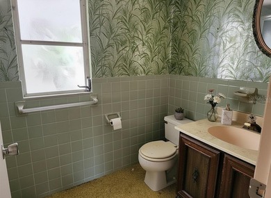 One or more photo(s) has been virtually staged. This charming on Jacaranda West Country Club in Florida - for sale on GolfHomes.com, golf home, golf lot