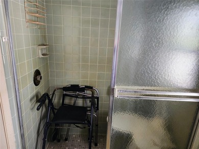 One or more photo(s) has been virtually staged. This charming on Jacaranda West Country Club in Florida - for sale on GolfHomes.com, golf home, golf lot