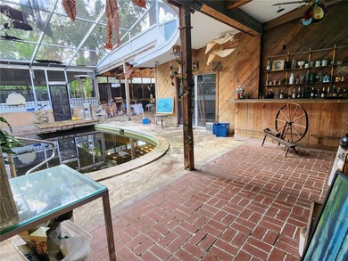 One or more photo(s) has been virtually staged. This charming on Jacaranda West Country Club in Florida - for sale on GolfHomes.com, golf home, golf lot