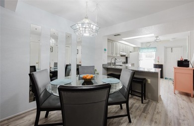 Enjoy peaceful lakefront views and effortless Florida living on Deep Creek Golf Club in Florida - for sale on GolfHomes.com, golf home, golf lot