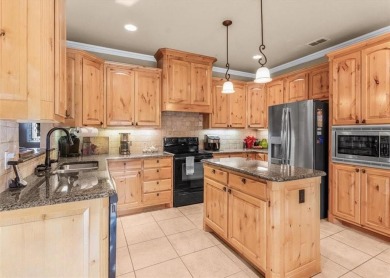 Nestled in a highly desirable gated community offering on Pecan Plantation Country Club in Texas - for sale on GolfHomes.com, golf home, golf lot