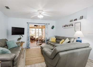 Enjoy peaceful lakefront views and effortless Florida living on Deep Creek Golf Club in Florida - for sale on GolfHomes.com, golf home, golf lot