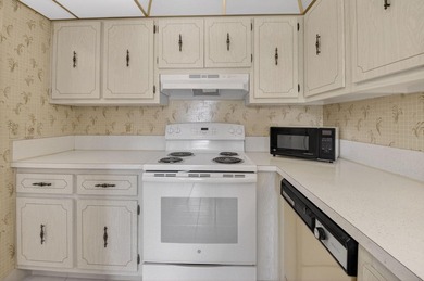 Immaculately maintained 2-bedroom, 2-bath condo centrally on Delray Beach Golf Club in Florida - for sale on GolfHomes.com, golf home, golf lot