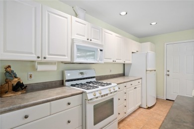 Welcome to this inviting 3-bedroom, 2-bath home nestled in the on Rockport Country Club in Texas - for sale on GolfHomes.com, golf home, golf lot
