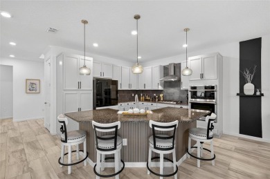 25 Shore Crab Way | 4 Bedrooms | 4 Bathrooms | 2,532 Sq Ft | on Apollo Beach Golf and Sea Club in Florida - for sale on GolfHomes.com, golf home, golf lot