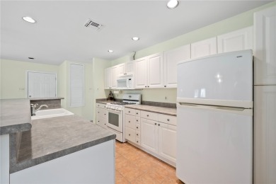 Welcome to this inviting 3-bedroom, 2-bath home nestled in the on Rockport Country Club in Texas - for sale on GolfHomes.com, golf home, golf lot