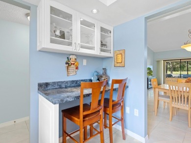 This charming 2-bedroom, 2-bath Briarfield villa is tucked on The Meadows Golf and Country Club in Florida - for sale on GolfHomes.com, golf home, golf lot
