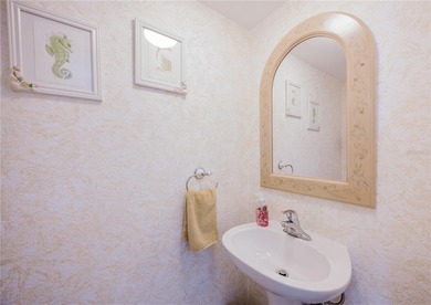 Enjoy peaceful lakefront views and effortless Florida living on Deep Creek Golf Club in Florida - for sale on GolfHomes.com, golf home, golf lot