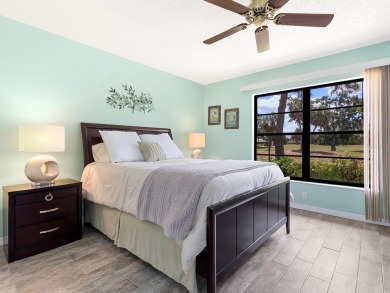 This charming 2-bedroom, 2-bath Briarfield villa is tucked on The Meadows Golf and Country Club in Florida - for sale on GolfHomes.com, golf home, golf lot