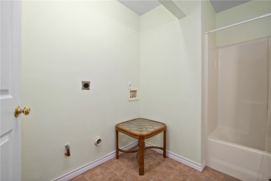 Welcome to this inviting 3-bedroom, 2-bath home nestled in the on Rockport Country Club in Texas - for sale on GolfHomes.com, golf home, golf lot