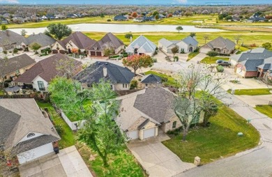 Nestled in a highly desirable gated community offering on Pecan Plantation Country Club in Texas - for sale on GolfHomes.com, golf home, golf lot