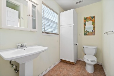 Welcome to this inviting 3-bedroom, 2-bath home nestled in the on Rockport Country Club in Texas - for sale on GolfHomes.com, golf home, golf lot