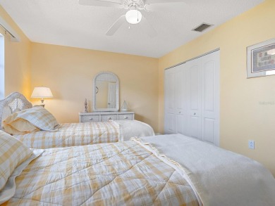This charming 2-bedroom, 2-bath Briarfield villa is tucked on The Meadows Golf and Country Club in Florida - for sale on GolfHomes.com, golf home, golf lot