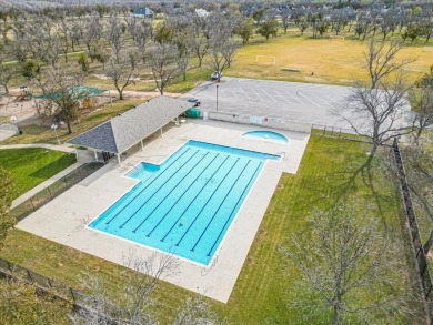 Nestled in a highly desirable gated community offering on Pecan Plantation Country Club in Texas - for sale on GolfHomes.com, golf home, golf lot