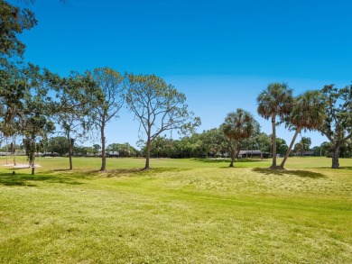 This charming 2-bedroom, 2-bath Briarfield villa is tucked on The Meadows Golf and Country Club in Florida - for sale on GolfHomes.com, golf home, golf lot