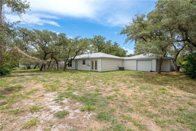 Welcome to this inviting 3-bedroom, 2-bath home nestled in the on Rockport Country Club in Texas - for sale on GolfHomes.com, golf home, golf lot