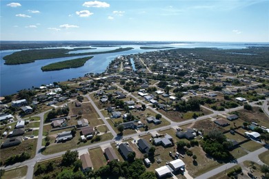 Excellent 2bd 2 bath home on triple lot with hurricane shutters on Deep Creek Golf Club in Florida - for sale on GolfHomes.com, golf home, golf lot