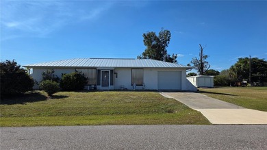 Excellent 2bd 2 bath home on triple lot with hurricane shutters on Deep Creek Golf Club in Florida - for sale on GolfHomes.com, golf home, golf lot