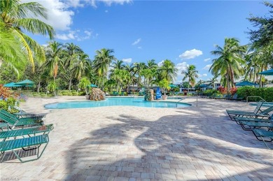 This gorgeous end-unit condominium for sale in the heart of Lely on Lely Resort Golf and Country Club in Florida - for sale on GolfHomes.com, golf home, golf lot