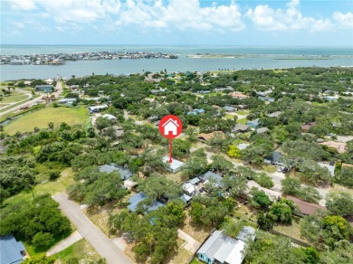 Welcome to this inviting 3-bedroom, 2-bath home nestled in the on Rockport Country Club in Texas - for sale on GolfHomes.com, golf home, golf lot