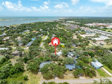 Welcome to this inviting 3-bedroom, 2-bath home nestled in the on Rockport Country Club in Texas - for sale on GolfHomes.com, golf home, golf lot