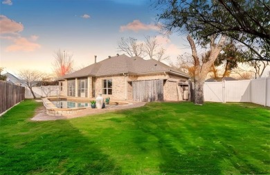 Nestled in a highly desirable gated community offering on Pecan Plantation Country Club in Texas - for sale on GolfHomes.com, golf home, golf lot