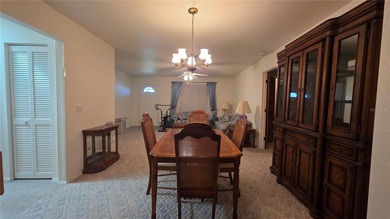 Excellent 2bd 2 bath home on triple lot with hurricane shutters on Deep Creek Golf Club in Florida - for sale on GolfHomes.com, golf home, golf lot