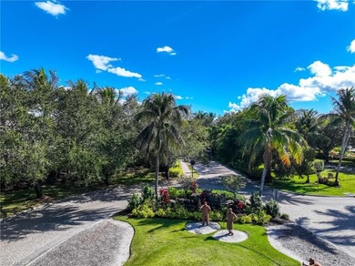 This gorgeous end-unit condominium for sale in the heart of Lely on Lely Resort Golf and Country Club in Florida - for sale on GolfHomes.com, golf home, golf lot