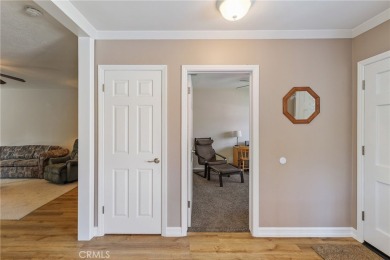 Discover warmth and comfort with this beautifully upgraded pool on Heartwell Golf Course in California - for sale on GolfHomes.com, golf home, golf lot
