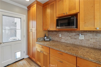 Discover warmth and comfort with this beautifully upgraded pool on Heartwell Golf Course in California - for sale on GolfHomes.com, golf home, golf lot