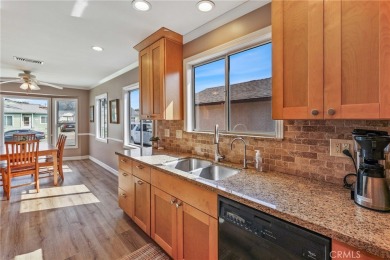 Discover warmth and comfort with this beautifully upgraded pool on Heartwell Golf Course in California - for sale on GolfHomes.com, golf home, golf lot