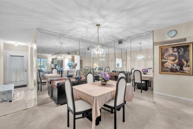 Welcome to this charming 55+ condo featuring tile flooring in on Wynmoor Golf Course in Florida - for sale on GolfHomes.com, golf home, golf lot