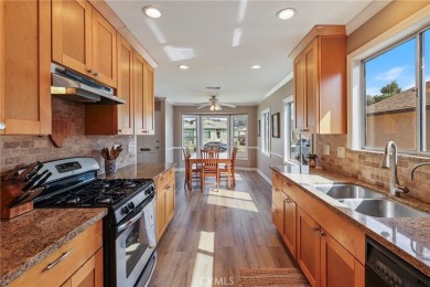 Discover warmth and comfort with this beautifully upgraded pool on Heartwell Golf Course in California - for sale on GolfHomes.com, golf home, golf lot