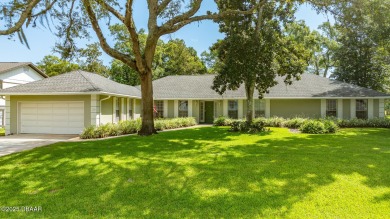 Stunning 3BR/2BA home in the desirable Tomoka Oaks community of on Tomoka Oaks Golf and Country Club in Florida - for sale on GolfHomes.com, golf home, golf lot