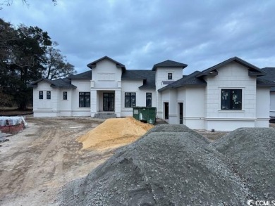 Custom Home Built on the waterway listed for Comp purposes on Barefoot Resort and Golf Club  in South Carolina - for sale on GolfHomes.com, golf home, golf lot