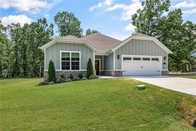 Built in 2024, this home sits on .29 acre lot minutes from I49 on Bella Vista Country Club - Highlands in Arkansas - for sale on GolfHomes.com, golf home, golf lot