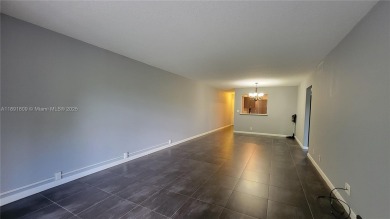Beautifully remodeled condo in the sought-after Granada Village on Wynmoor Golf Course in Florida - for sale on GolfHomes.com, golf home, golf lot