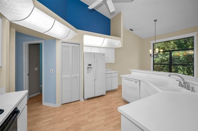 IN TIMBER GREENS A 55+ GATED GOLF COMMUNITY... This 2-bedroom 2 on Timber Greens Country Club in Florida - for sale on GolfHomes.com, golf home, golf lot