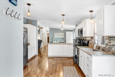 Effortless lakefront living meets income potential--welcome to on Tanglewood Shores Golf Club in Virginia - for sale on GolfHomes.com, golf home, golf lot