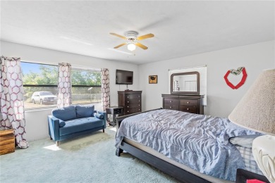 One or more photo(s) has been virtually staged. SPACIOUS FAMILY on Williston Highlands Golf and Country Club in Florida - for sale on GolfHomes.com, golf home, golf lot